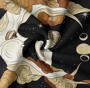 Close-up of golden moon and sun tapestry fabric with detailed celestial art texture