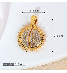 Detailed size view of the gold sun pendant with pave zircon and dimension markers