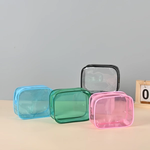 Portable transparent PVC makeup bags in four colors with zipper for toiletry storage