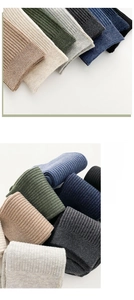 Detailed ribbed texture of premium cotton mid-calf business socks in multiple colors