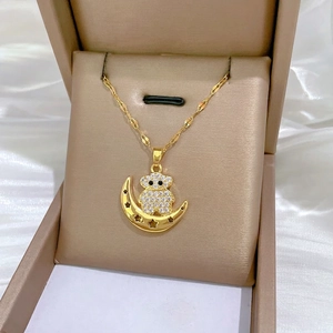 Golden bear and moon pendant necklace with sparkling zircons in a premium jewelry box