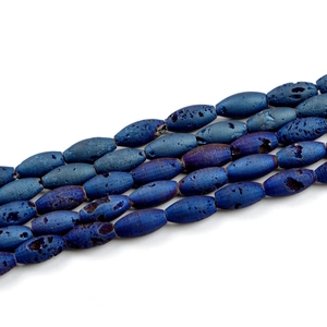 Macro detail of blue and purple druzy agate oval rice beads for DIY bohemian jewelry