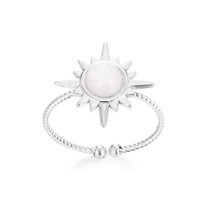 Detailed shot of bohemian silver sun ring with white gemstone and twisted rope band