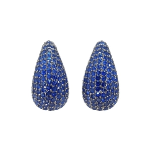 Elegant silver drop earrings with blue pave-set crystals on a minimalist white background