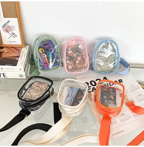 Group of colorful transparent PVC mini crossbody bags in various neon shades