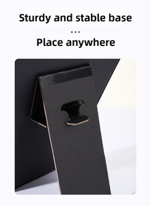 Detail of the foldable back support stand on a black jewelry necklace display board
