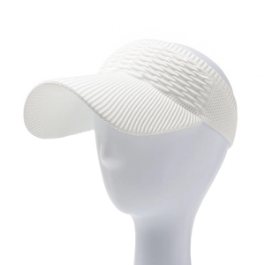Detailed view of white knitted sun visor with breathable ribbed texture and wide brim