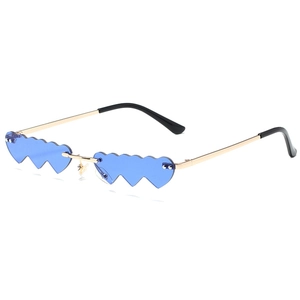 Blue heart-shaped rimless sunglasses with gold metal temples shown from a side view