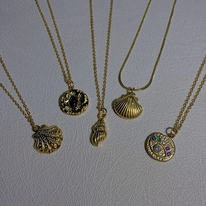 Bohemian gold plated titanium steel necklaces with conch shell and evil eye pendants