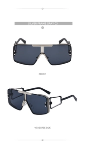 Close-up of silver steampunk sunglasses with gray lenses showing front and side views