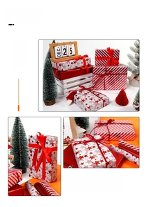 Close-up of red and white Christmas wrapping paper with stars, stripes, and red ribbons