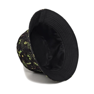 Outdoor skull mushroom bucket hat with neon green and pink prints on black canvas