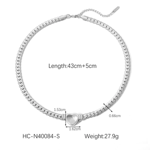 Detail of silver Cuban link necklace with heart pendant and specific measurements