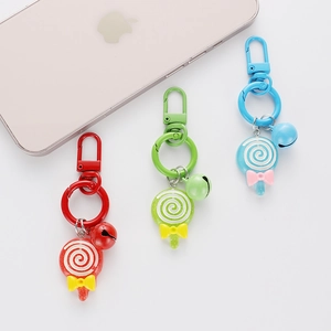 Set of three colorful lollipop keychains with bells and resin pendants for women