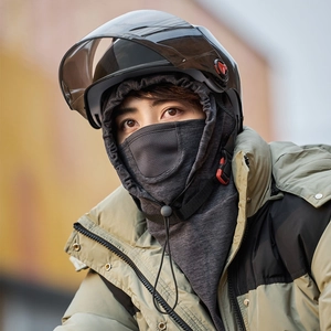 Detail of dark grey cycling hood with breathable face mask and adjustable drawstring