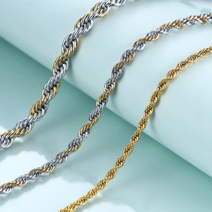 Macro shot of 2mm to 4mm rope chains in silver and gold finishes with tight weave texture