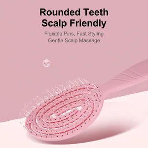 Pink vented spiral detangling brush with flexible massage bristles for hair styling