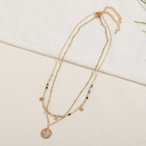 Elegant gold layered necklace with colorful beads and a round coin pendant for women