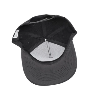 Internal view of snapback hat with six-panel structure and reinforced seams detail