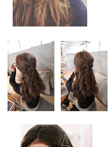 Detailed view of geometric gold moon and silver triangle hair clips on hair