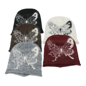 Winter oversized knit beanie collection with butterfly pattern in multiple colors