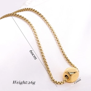 Detailed macro view showing the 12mm polished cube pendant on a 60cm gold square chain