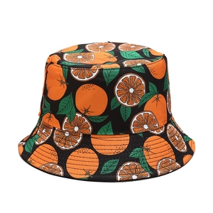 Reversible bucket hat with orange fruit pattern and sun protection for outdoor activities