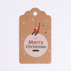 Brown kraft paper Christmas tag featuring Santa and Merry Christmas text for gift DIY