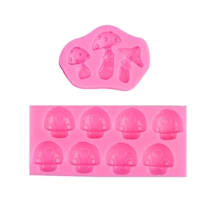 Pink silicone mold set featuring various mushroom shapes for creative cake decorating