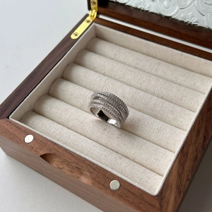 Close-up of S925 sterling silver multi-layer heart ring with pavé-set cubic zirconia