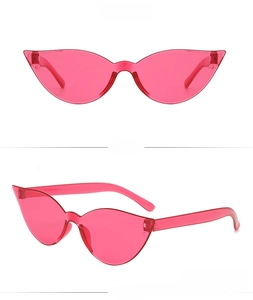 Front and side view of trendy rose red rimless cat eye sunglasses with translucent lenses