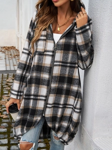 Detail of color block plaid hoodie with black, white and brown checkered pattern