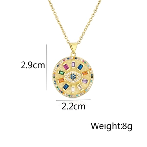 Detail view of 18K gold plated evil eye pendant with dimensions 2.9cm by 2.2cm and weight 8g