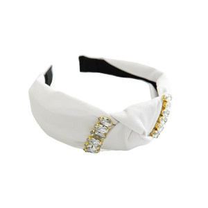 White knotted fabric headband with elegant square rhinestones in gold settings