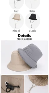 Detail of quilted windproof bucket hat showing fabric texture and adjustable drawcord buckle