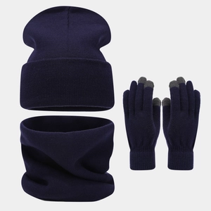 Three-piece navy blue ribbed knit set with touchscreen gloves, scarf, and warm winter hat