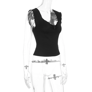 Detail of slim fit black heart-neck tank top with delicate center ruching and ribbed texture