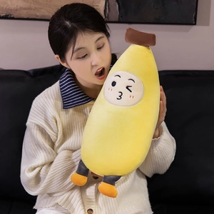 Cute banana plush pillow with funny facial expressions and soft yellow fabric