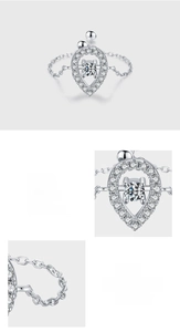 Detail of S925 silver teardrop ring featuring pave-set 5A cubic zirconia stones