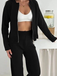 Women's chic black knit zipper cardigan set with white ribbed vest and high waist trousers