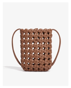 Detailed close-up of brown woven leather texture on a vertical mini crossbody phone bag