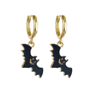 Detail of golden hoop earrings with black bat pendants and smiling face for Halloween
