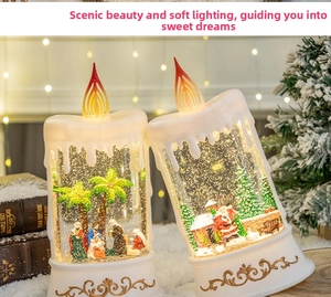 Close-up of LED Christmas candle snow globes with Nativity and Santa Claus scenes