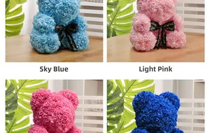 Detail of rose teddy bears in light pink and blue with Just for you ribbon ties