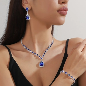 Luxury blue rhinestone jewelry set including necklace, earrings and bracelet in silver