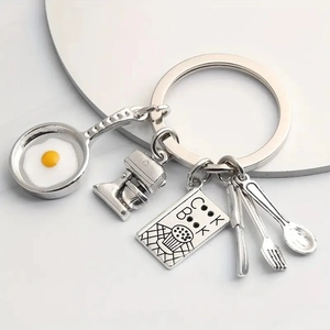 Kitchen themed metal keychain with mini frying pan, whisk, cookbook and cutlery charms