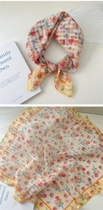 Detailed view of floral cotton linen square scarf with yellow border and pink flower pattern