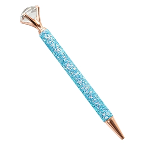 Blue glitter ballpoint pen with large diamond top and rose gold metal trim