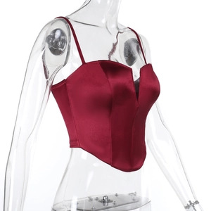 Detail view of burgundy satin corset top with v-neck and structured boning design