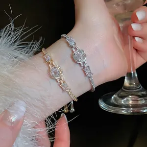 Luxurious adjustable gold and silver bracelets with sparkling square zircon crystals